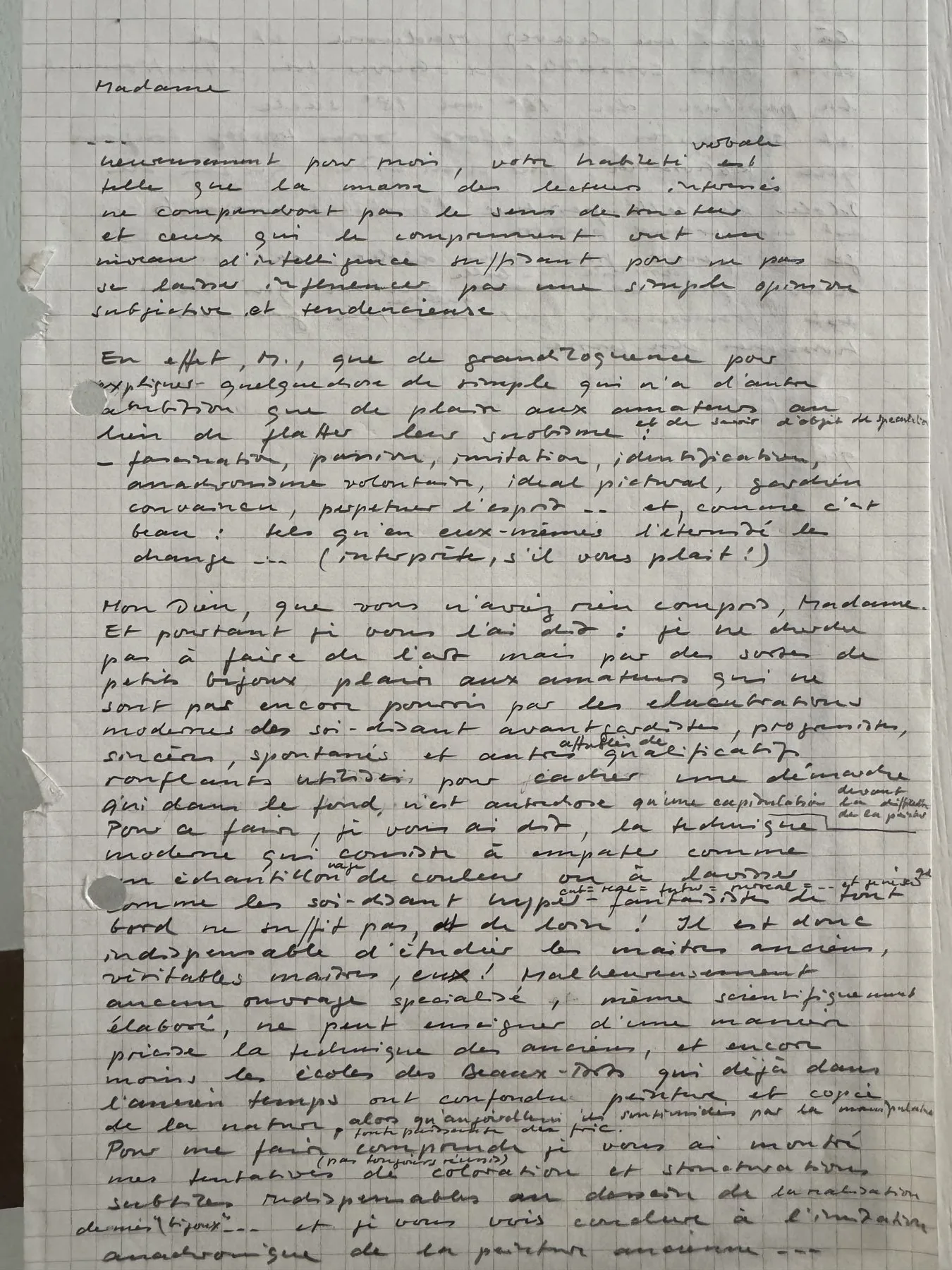 Page manuscrite à l'encre noire sur papier quadrillé, écriture dense et régulière.